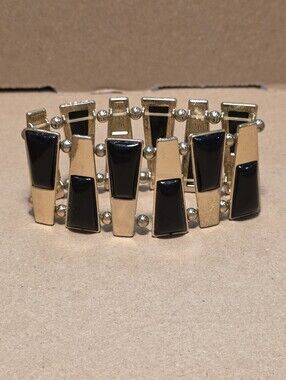 Elegant Black and Gold Metal Bracelet